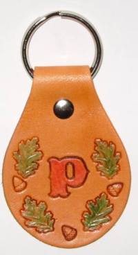 Key fob with oak leaves and acorn design
